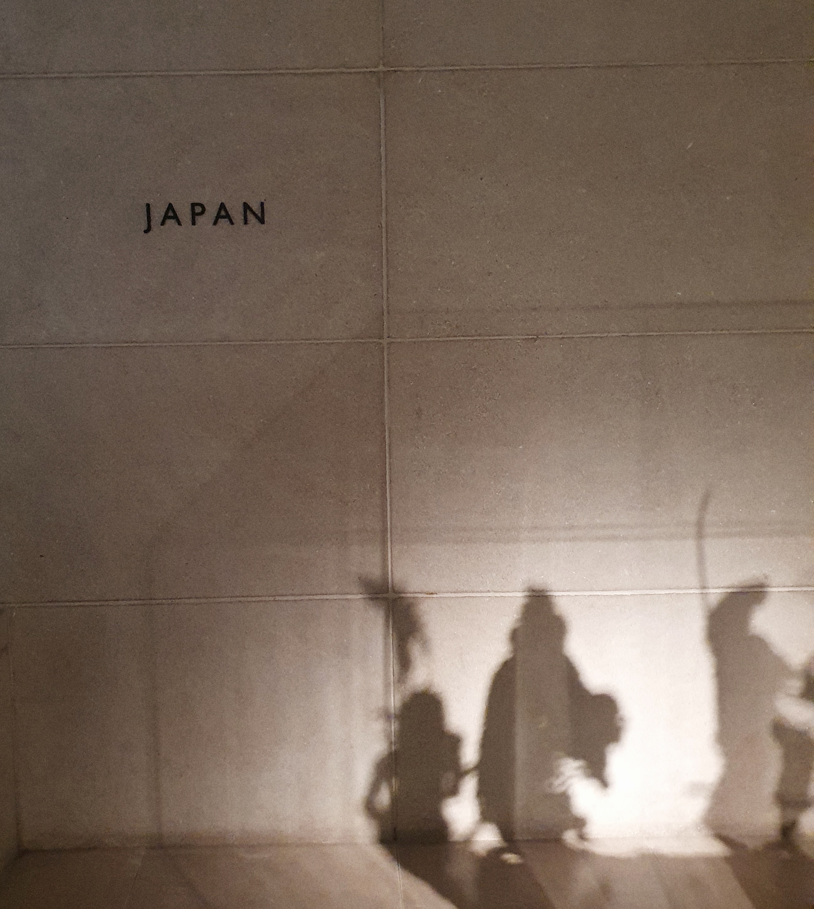 Wall behind Japanese sculpture